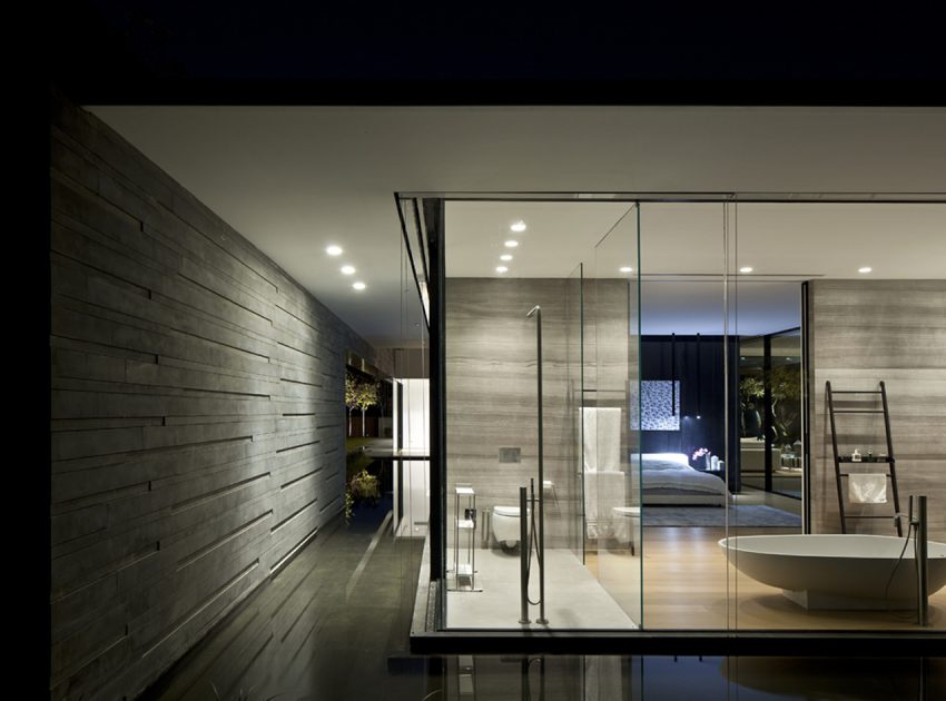 A Striking Modern Home Composed of Concrete and Glass Structure in Tel Aviv by Pitsou Kedem Architects (25)