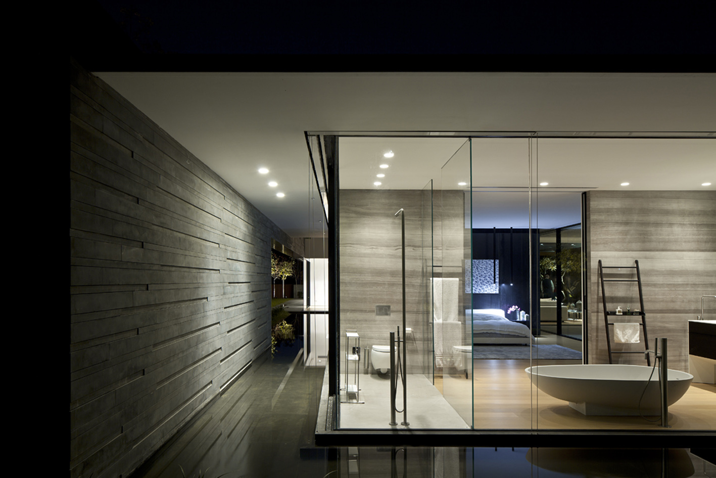 A Striking Modern Home Composed of Concrete and Glass Structure in Tel Aviv by Pitsou Kedem Architects (25)
