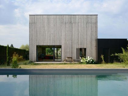 A Stunning Bioclimatic House with Prefabricated Modular System and Thick Walls in Lyon, France