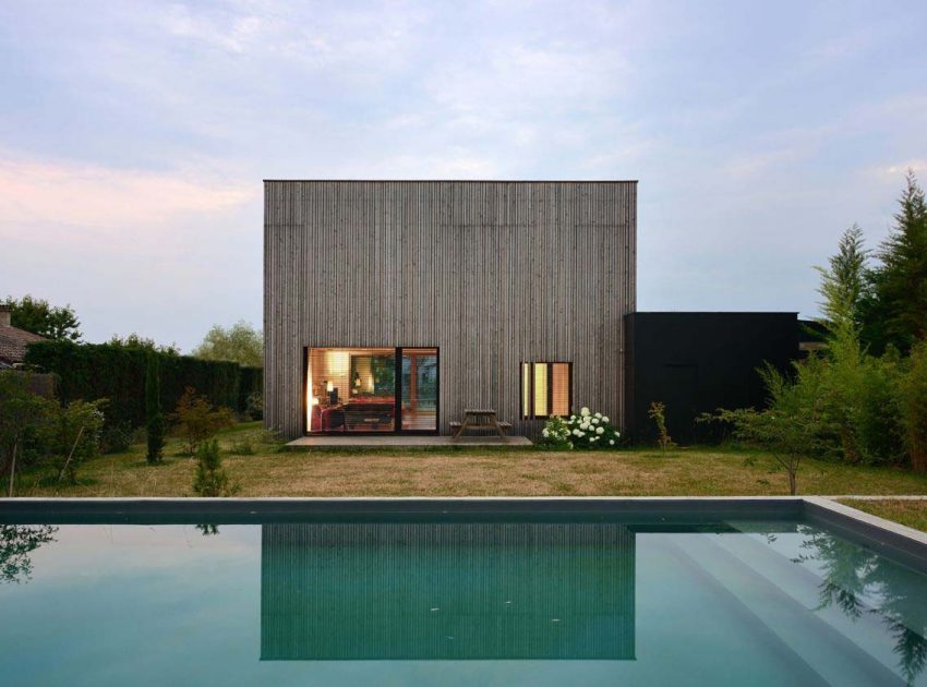 A Stunning Bioclimatic House with Prefabricated Modular System and Thick Walls in Lyon, France by Tectoniques Architects (7)