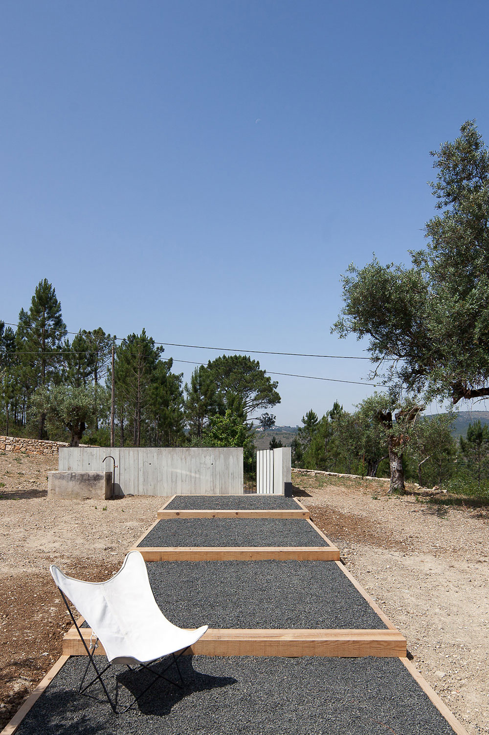 A Stunning Concrete Home Surrounded by Fields and Vegetation in Fonte Boa by João Mendes Ribeiro (12)