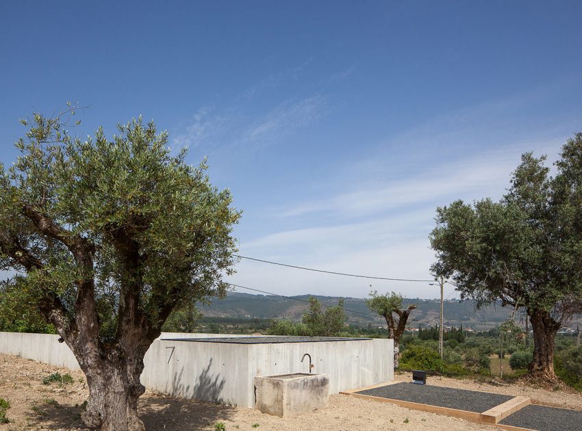 A Stunning Concrete Home Surrounded by Fields and Vegetation in Fonte Boa by João Mendes Ribeiro (13)