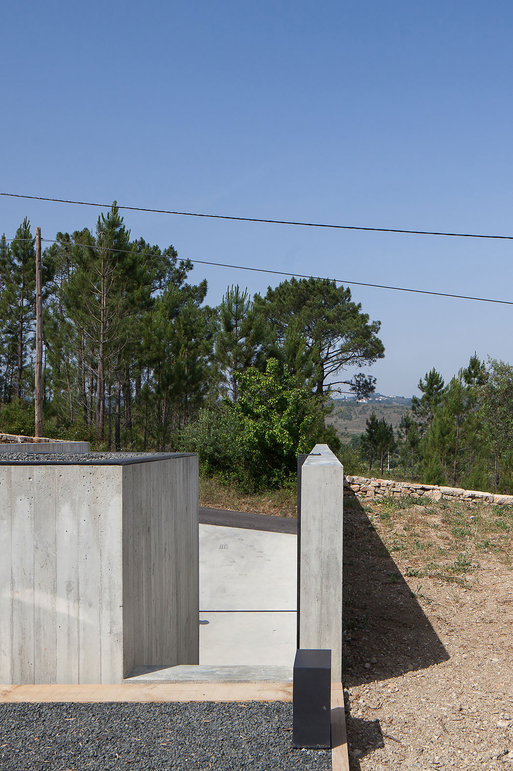A Stunning Concrete Home Surrounded by Fields and Vegetation in Fonte Boa by João Mendes Ribeiro (14)