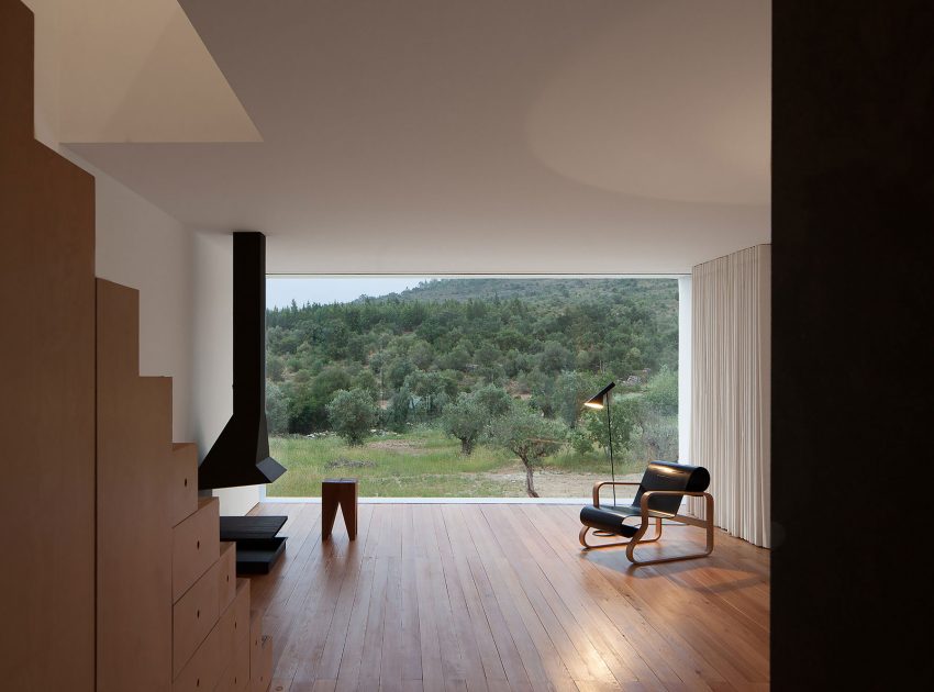 A Stunning Concrete Home Surrounded by Fields and Vegetation in Fonte Boa by João Mendes Ribeiro (15)