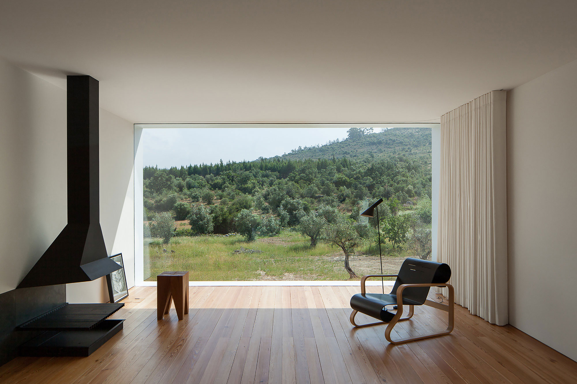A Stunning Concrete Home Surrounded by Fields and Vegetation in Fonte Boa by João Mendes Ribeiro (16)