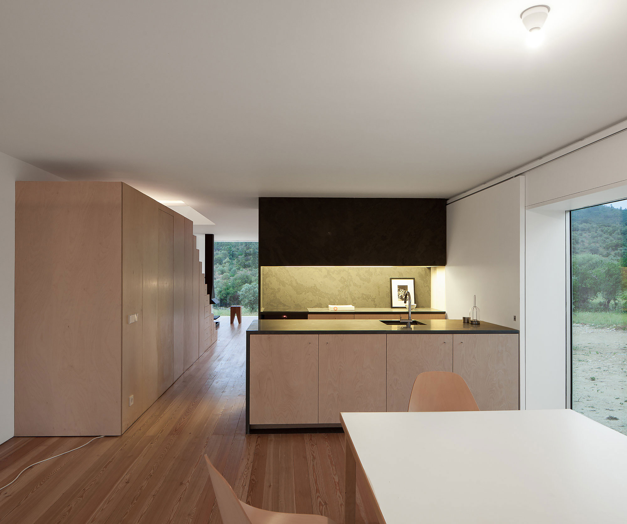 A Stunning Concrete Home Surrounded by Fields and Vegetation in Fonte Boa by João Mendes Ribeiro (21)