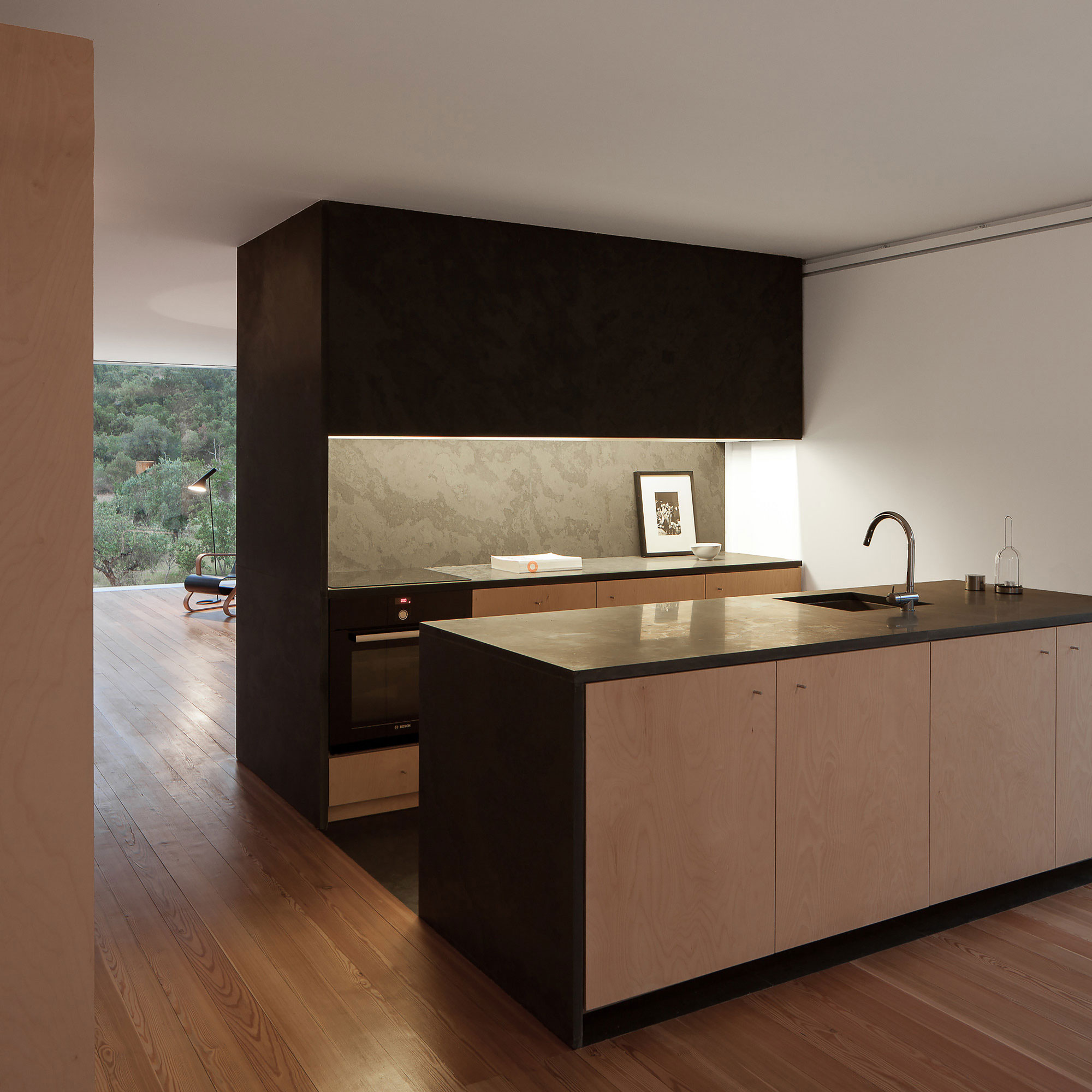 A Stunning Concrete Home Surrounded by Fields and Vegetation in Fonte Boa by João Mendes Ribeiro (22)