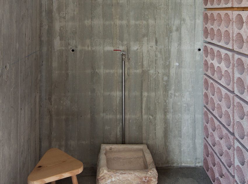 A Stunning Concrete Home Surrounded by Fields and Vegetation in Fonte Boa by João Mendes Ribeiro (29)