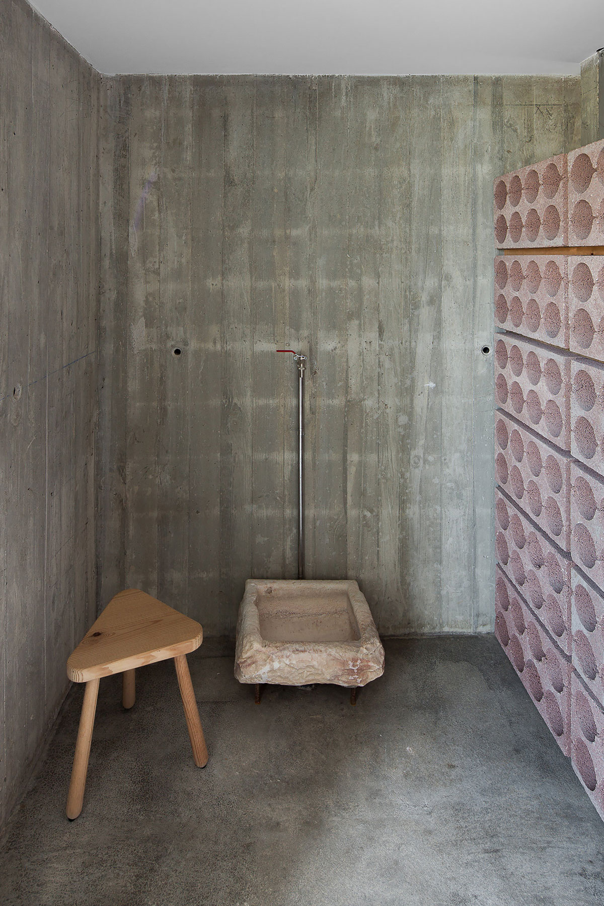 A Stunning Concrete Home Surrounded by Fields and Vegetation in Fonte Boa by João Mendes Ribeiro (29)