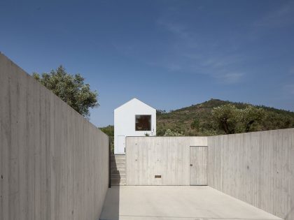 A Stunning Concrete Home Surrounded by Fields and Vegetation in Fonte Boa by João Mendes Ribeiro (3)