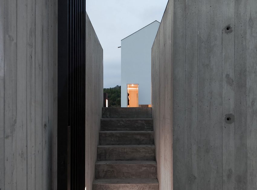 A Stunning Concrete Home Surrounded by Fields and Vegetation in Fonte Boa by João Mendes Ribeiro (30)