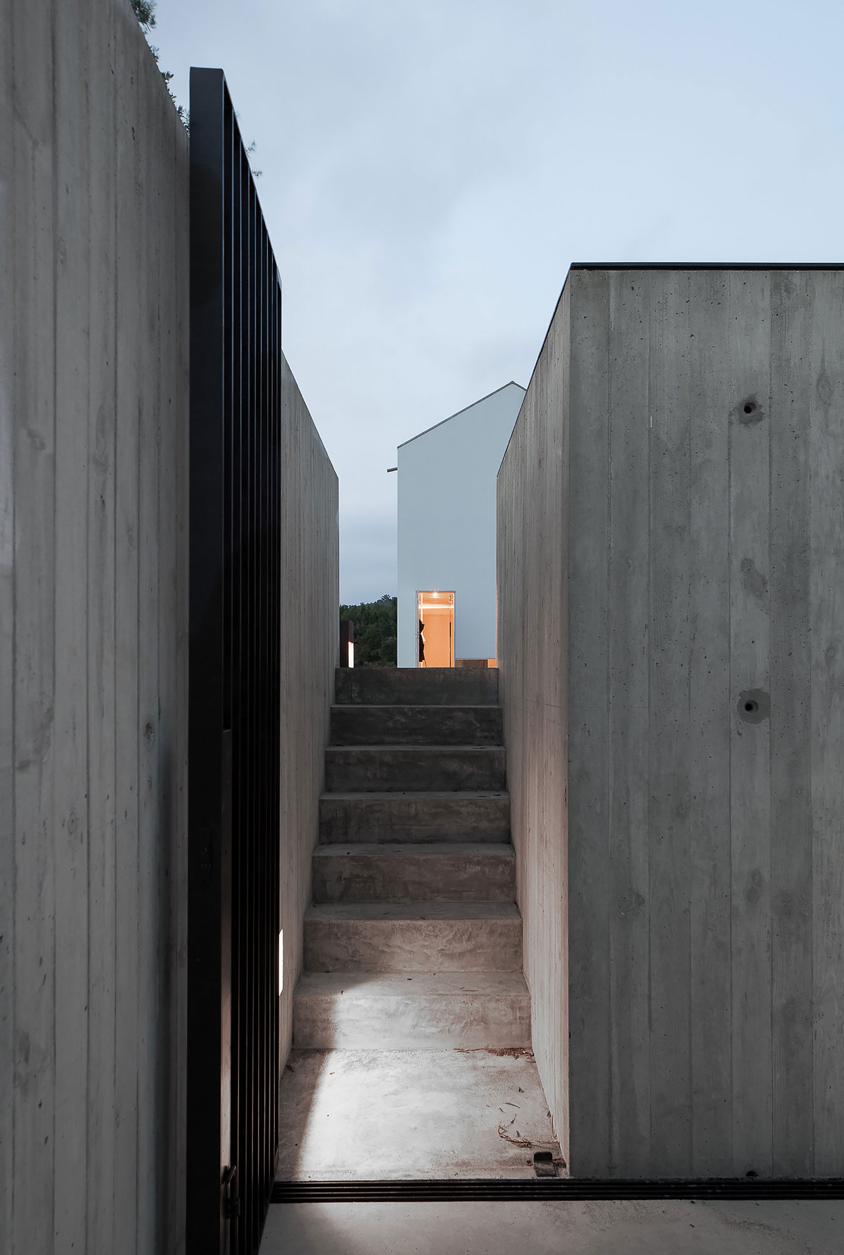 A Stunning Concrete Home Surrounded by Fields and Vegetation in Fonte Boa by João Mendes Ribeiro (30)
