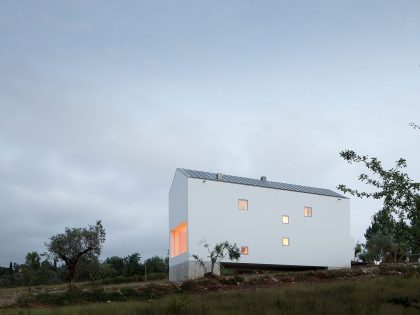 A Stunning Concrete Home Surrounded by Fields and Vegetation in Fonte Boa by João Mendes Ribeiro (32)