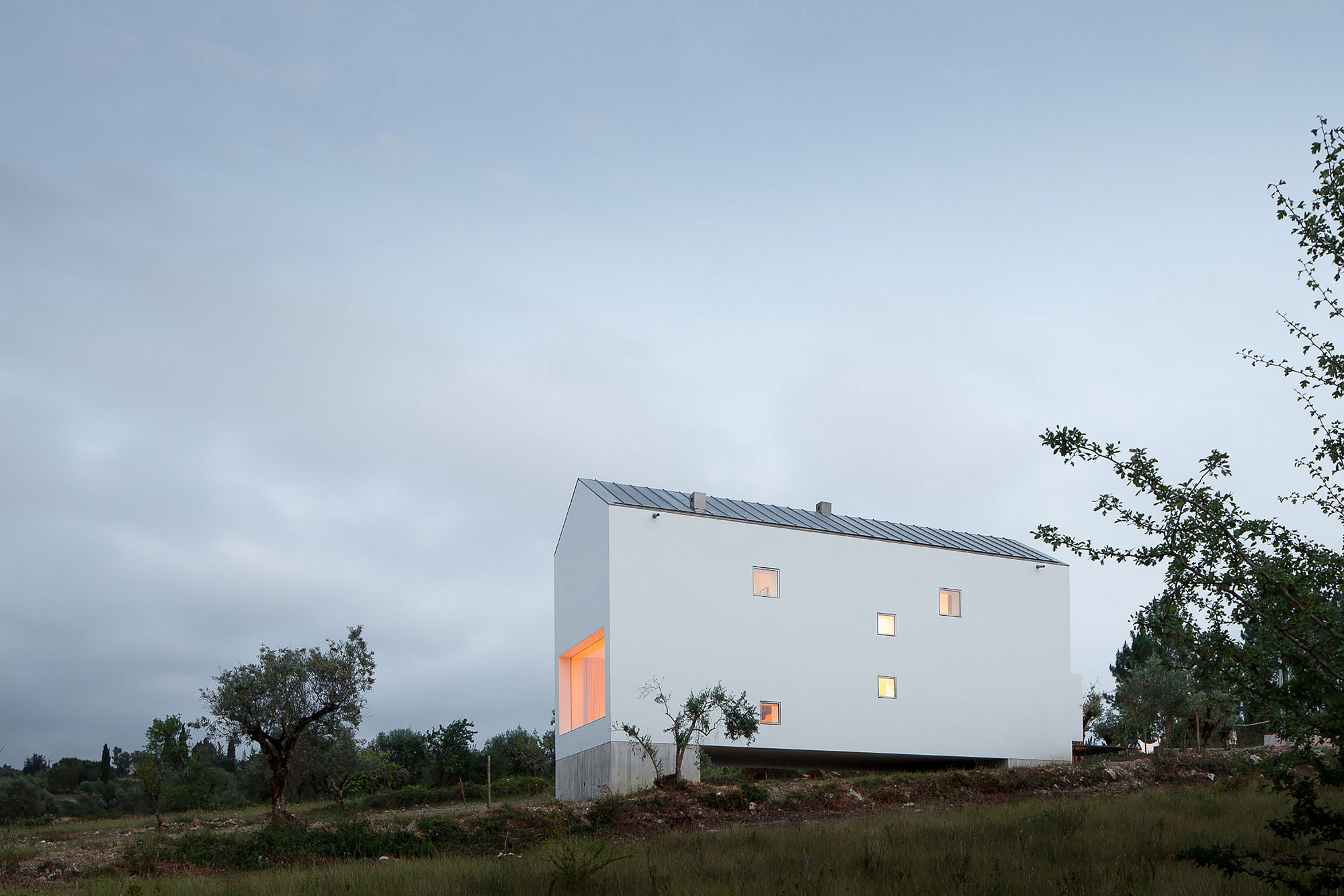 A Stunning Concrete Home Surrounded by Fields and Vegetation in Fonte Boa by João Mendes Ribeiro (32)
