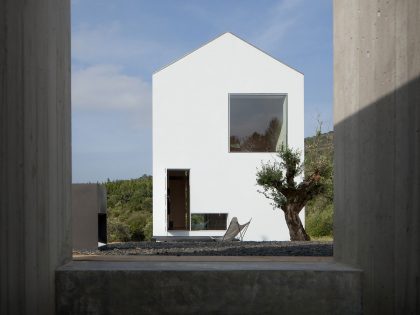 A Stunning Concrete Home Surrounded by Fields and Vegetation in Fonte Boa by João Mendes Ribeiro (4)