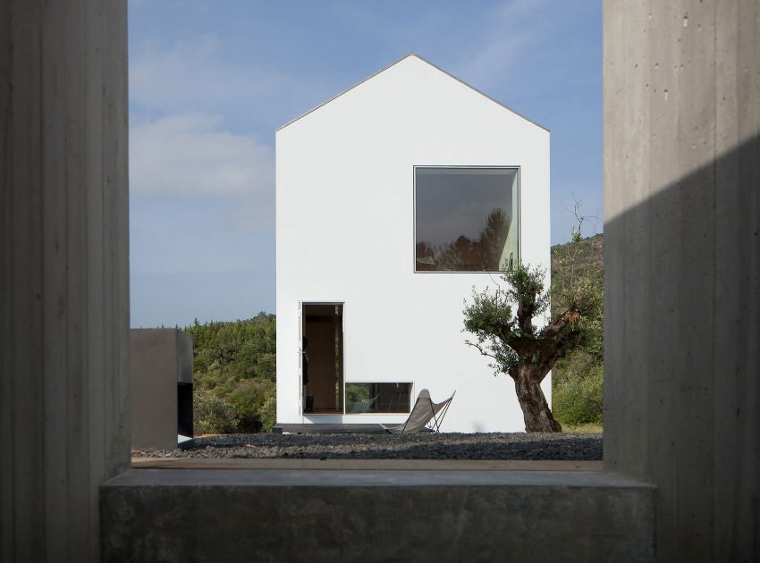 A Stunning Concrete Home Surrounded by Fields and Vegetation in Fonte Boa by João Mendes Ribeiro (4)