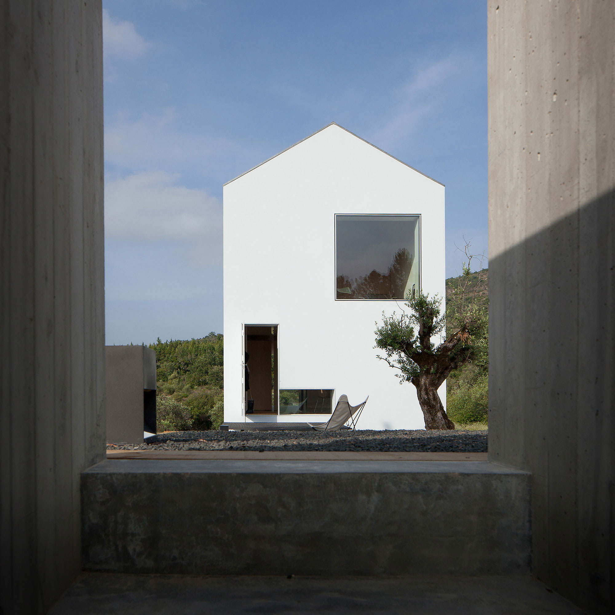 A Stunning Concrete Home Surrounded by Fields and Vegetation in Fonte Boa by João Mendes Ribeiro (4)