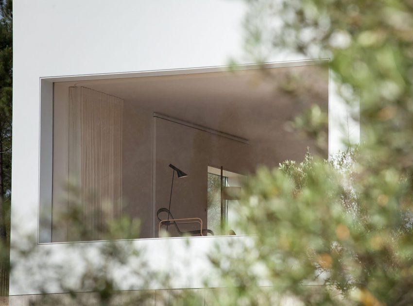 A Stunning Concrete Home Surrounded by Fields and Vegetation in Fonte Boa by João Mendes Ribeiro (6)