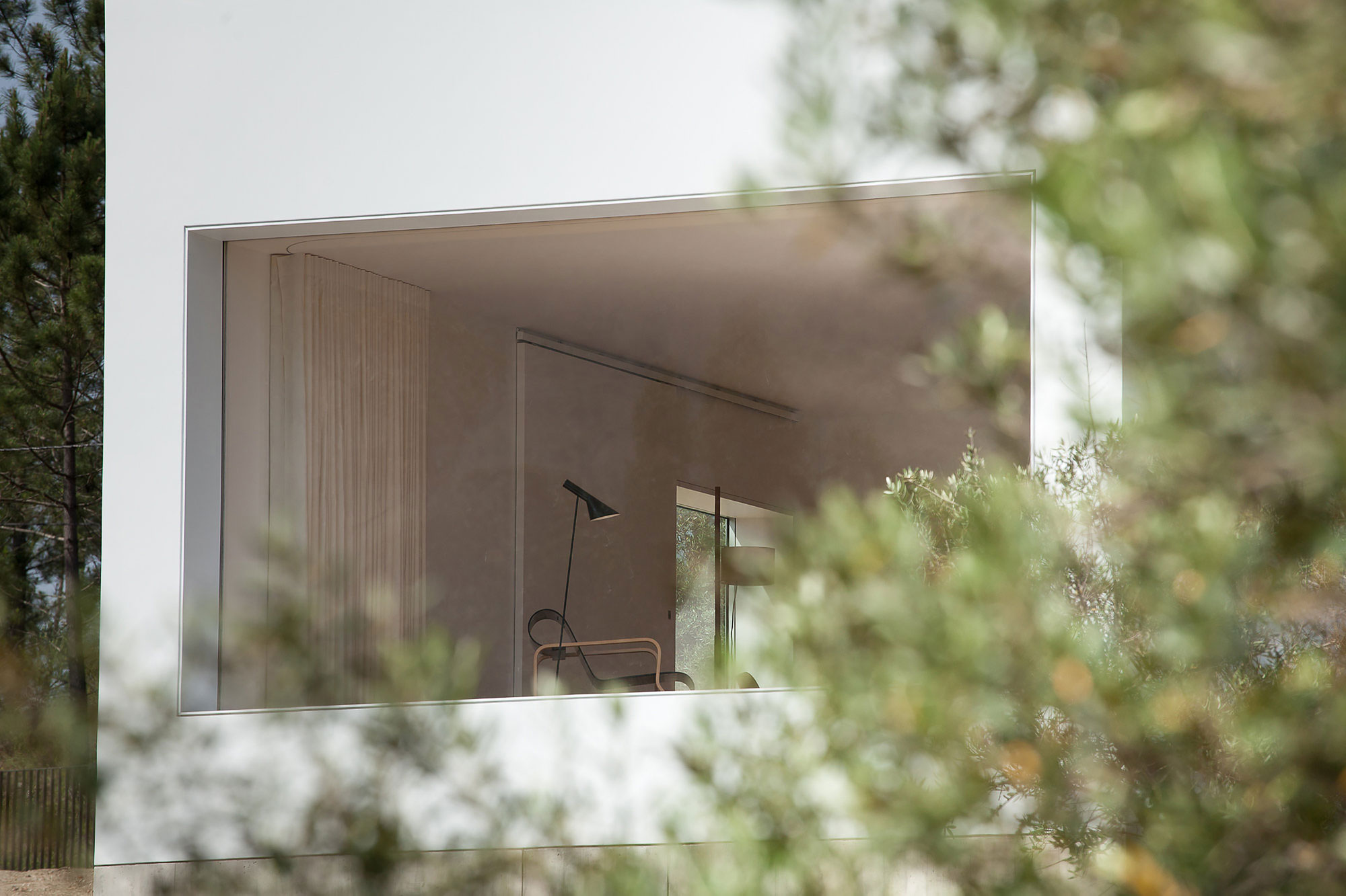 A Stunning Concrete Home Surrounded by Fields and Vegetation in Fonte Boa by João Mendes Ribeiro (6)