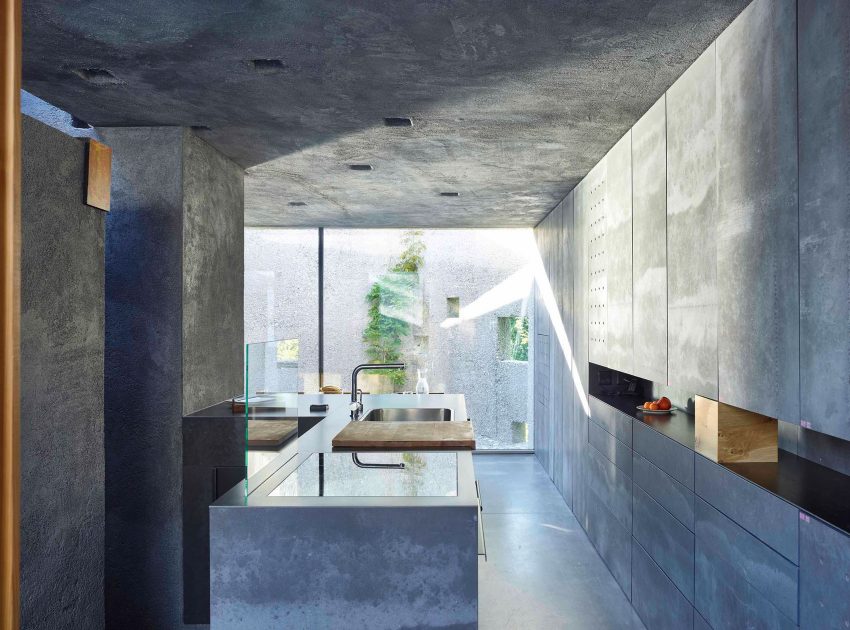 A Stunning Concrete House for a Family of Three Persons on the Lake Maggiore by Wespi de Meuron Romeo Architects (11)