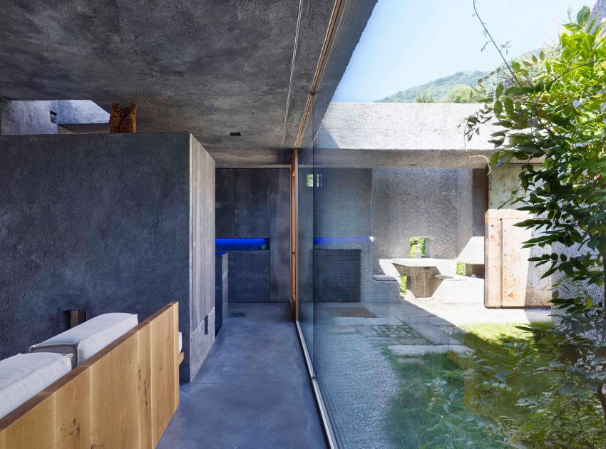 A Stunning Concrete House for a Family of Three Persons on the Lake Maggiore by Wespi de Meuron Romeo Architects (9)