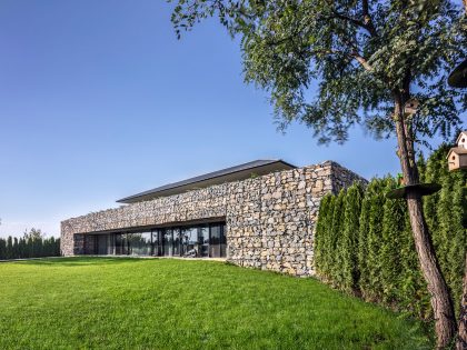 A Stunning Home with Gabion Walls and a Grassy Viewing Deck in Sofia, Bulgaria