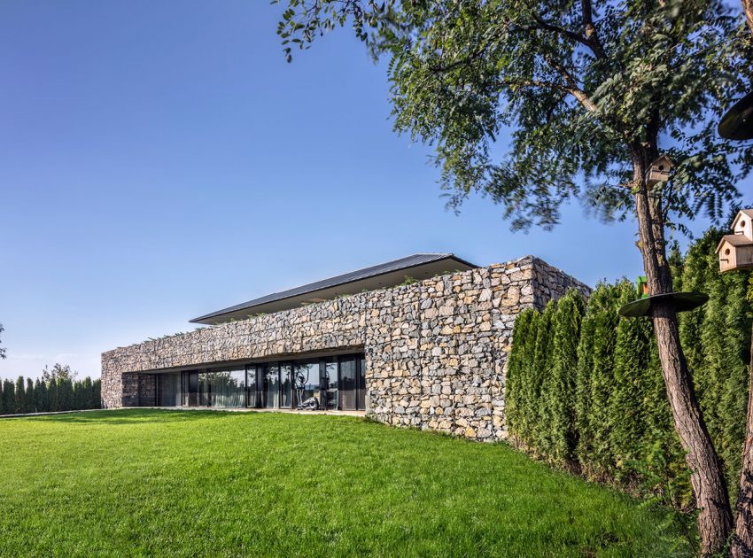 A Stunning Home with Gabion Walls and a Grassy Viewing Deck in Sofia, Bulgaria by I/O Architects (1)