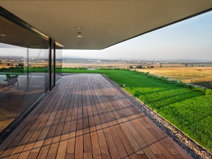 A Stunning Home with Gabion Walls and a Grassy Viewing Deck in Sofia, Bulgaria by I/O Architects (10)