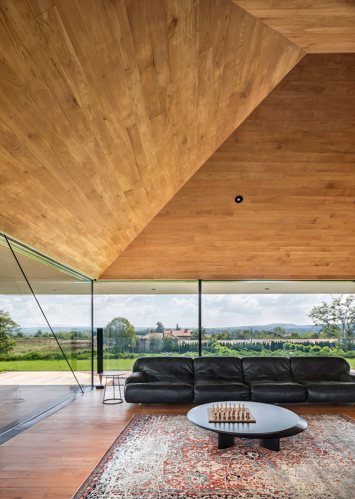 A Stunning Home with Gabion Walls and a Grassy Viewing Deck in Sofia, Bulgaria by I/O Architects (15)