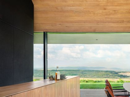 A Stunning Home with Gabion Walls and a Grassy Viewing Deck in Sofia, Bulgaria by I/O Architects (17)