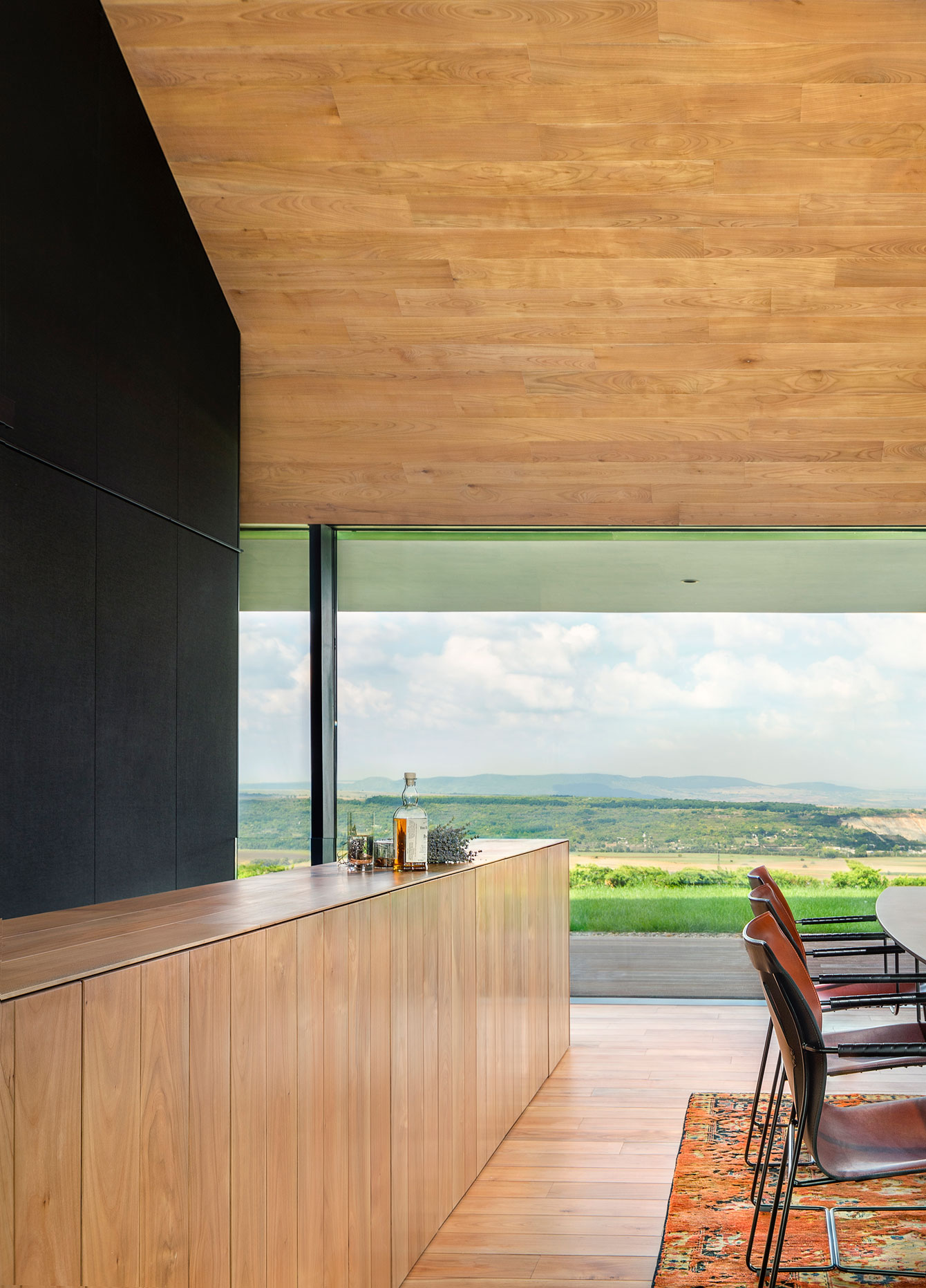 A Stunning Home with Gabion Walls and a Grassy Viewing Deck in Sofia, Bulgaria by I/O Architects (17)