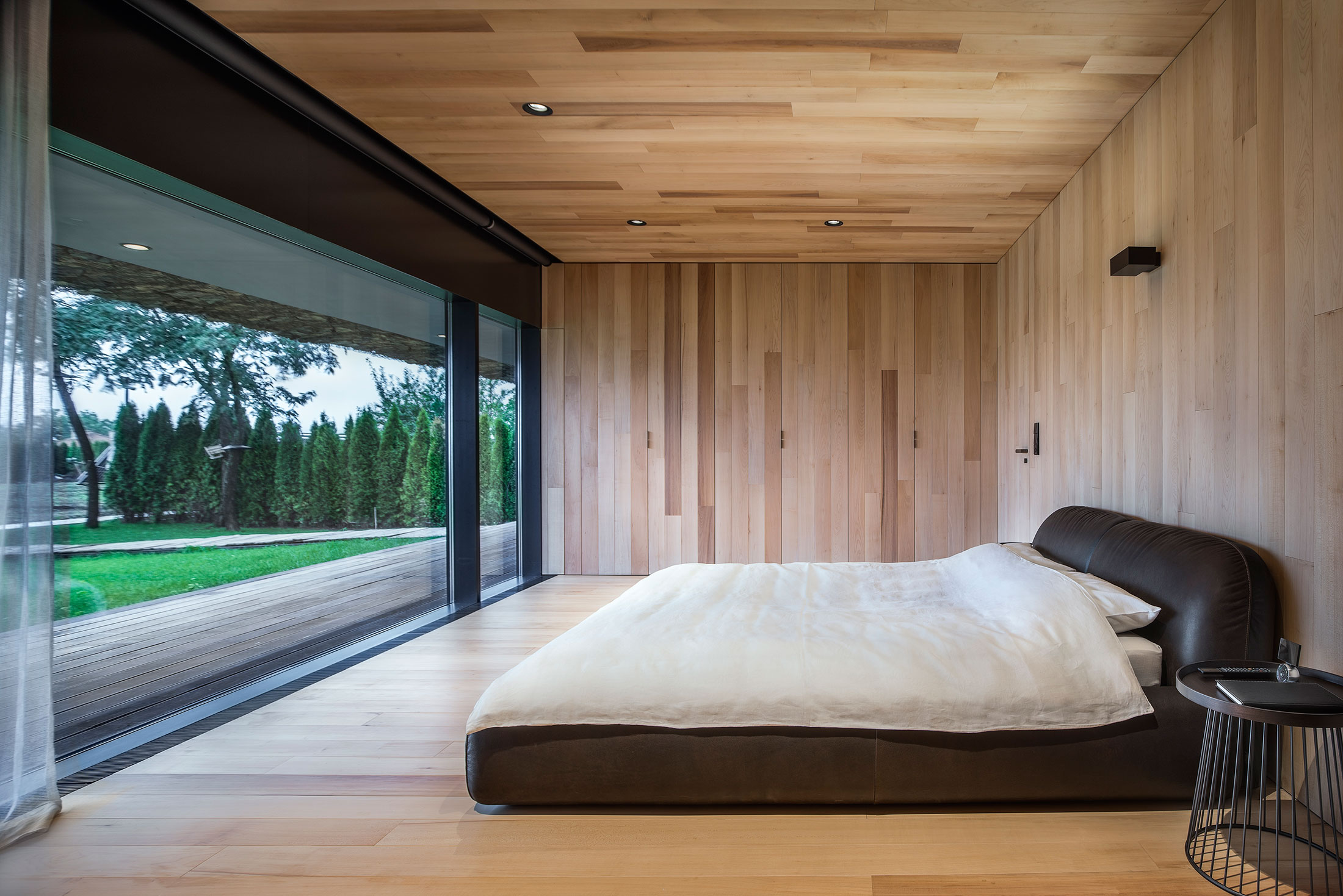 A Stunning Home with Gabion Walls and a Grassy Viewing Deck in Sofia, Bulgaria by I/O Architects (21)