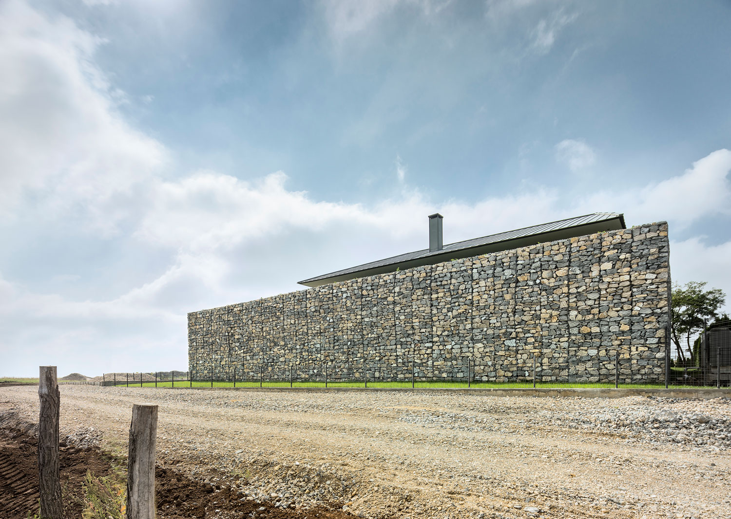 A Stunning Home with Gabion Walls and a Grassy Viewing Deck in Sofia, Bulgaria by I/O Architects (5)