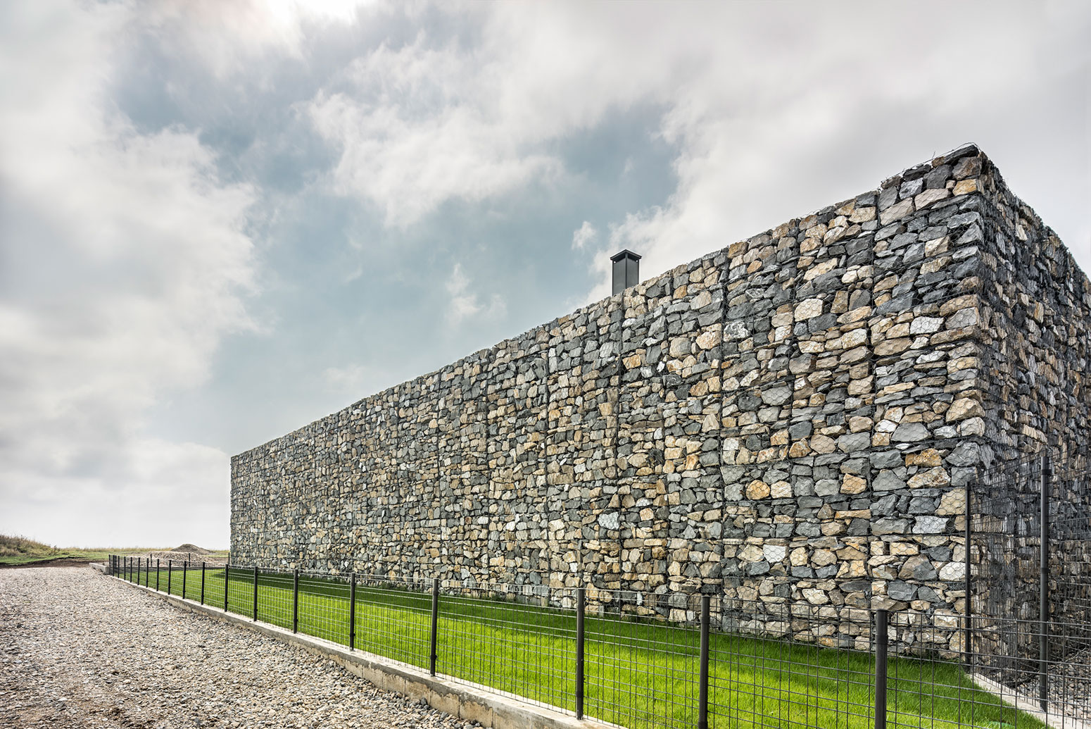 A Stunning Home with Gabion Walls and a Grassy Viewing Deck in Sofia, Bulgaria by I/O Architects (6)