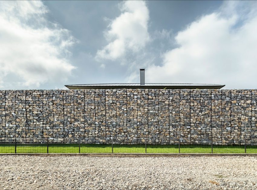 A Stunning Home with Gabion Walls and a Grassy Viewing Deck in Sofia, Bulgaria by I/O Architects (7)