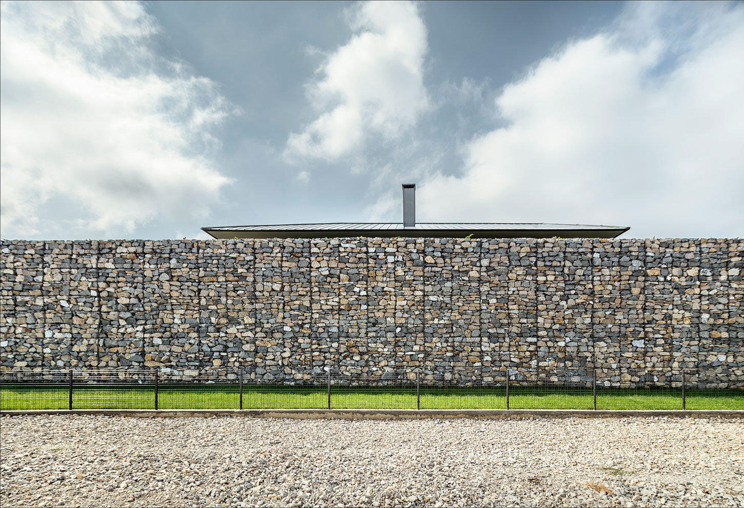 A Stunning Home with Gabion Walls and a Grassy Viewing Deck in Sofia, Bulgaria by I/O Architects (7)