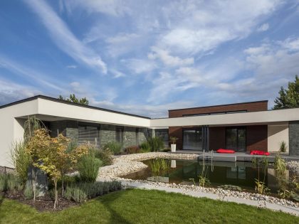 A Stunning L-Shaped Modern House for a Four-Person Family in Mosonmagyaróvár, Hungary