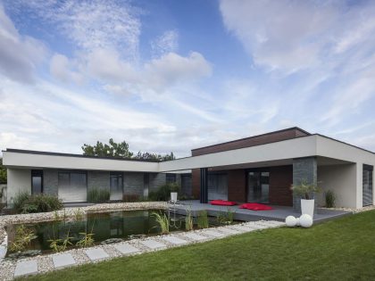 A Stunning L-Shaped Modern House for a Four-Person Family in Mosonmagyaróvár, Hungary by TOTH PROJECT (2)