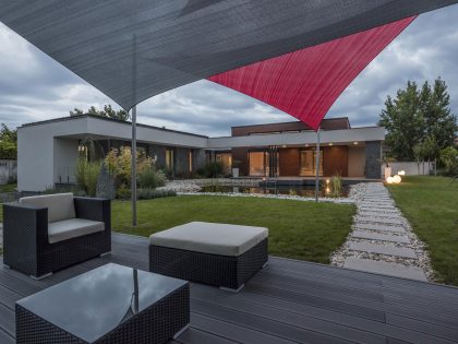 A Stunning L-Shaped Modern House for a Four-Person Family in Mosonmagyaróvár, Hungary by TOTH PROJECT (20)