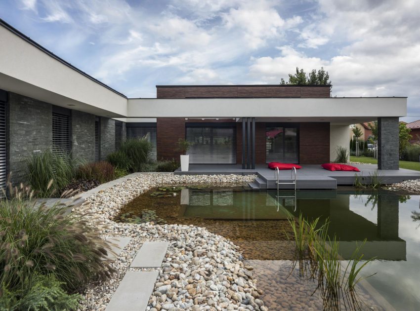 A Stunning L-Shaped Modern House for a Four-Person Family in Mosonmagyaróvár, Hungary by TOTH PROJECT (3)