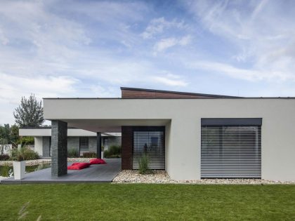 A Stunning L-Shaped Modern House for a Four-Person Family in Mosonmagyaróvár, Hungary by TOTH PROJECT (4)