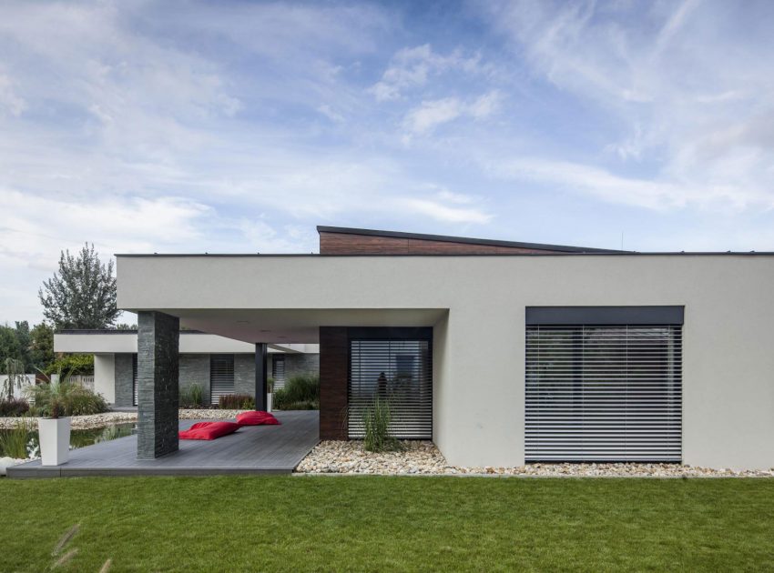 A Stunning L-Shaped Modern House for a Four-Person Family in Mosonmagyaróvár, Hungary by TOTH PROJECT (4)