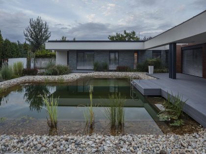 A Stunning L-Shaped Modern House for a Four-Person Family in Mosonmagyaróvár, Hungary by TOTH PROJECT (5)