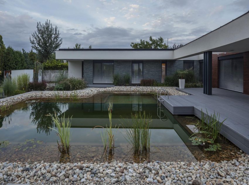 A Stunning L-Shaped Modern House for a Four-Person Family in Mosonmagyaróvár, Hungary by TOTH PROJECT (5)