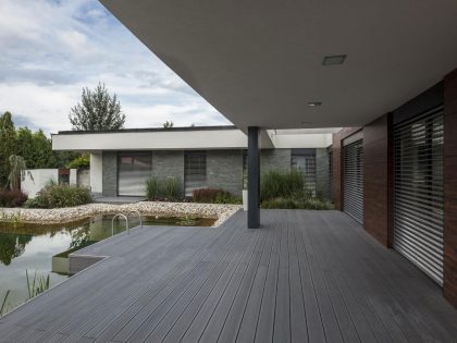 A Stunning L-Shaped Modern House for a Four-Person Family in Mosonmagyaróvár, Hungary by TOTH PROJECT (6)