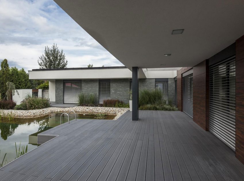 A Stunning L-Shaped Modern House for a Four-Person Family in Mosonmagyaróvár, Hungary by TOTH PROJECT (6)