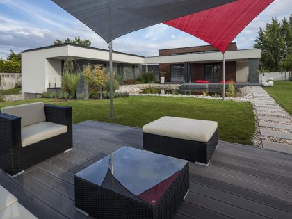 A Stunning L-Shaped Modern House for a Four-Person Family in Mosonmagyaróvár, Hungary by TOTH PROJECT (7)