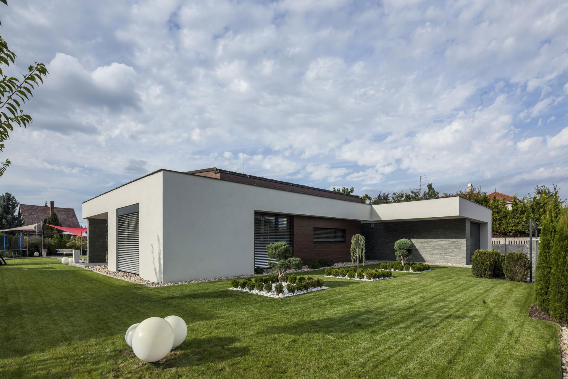 A Stunning L-Shaped Modern House for a Four-Person Family in Mosonmagyaróvár, Hungary by TOTH PROJECT (8)