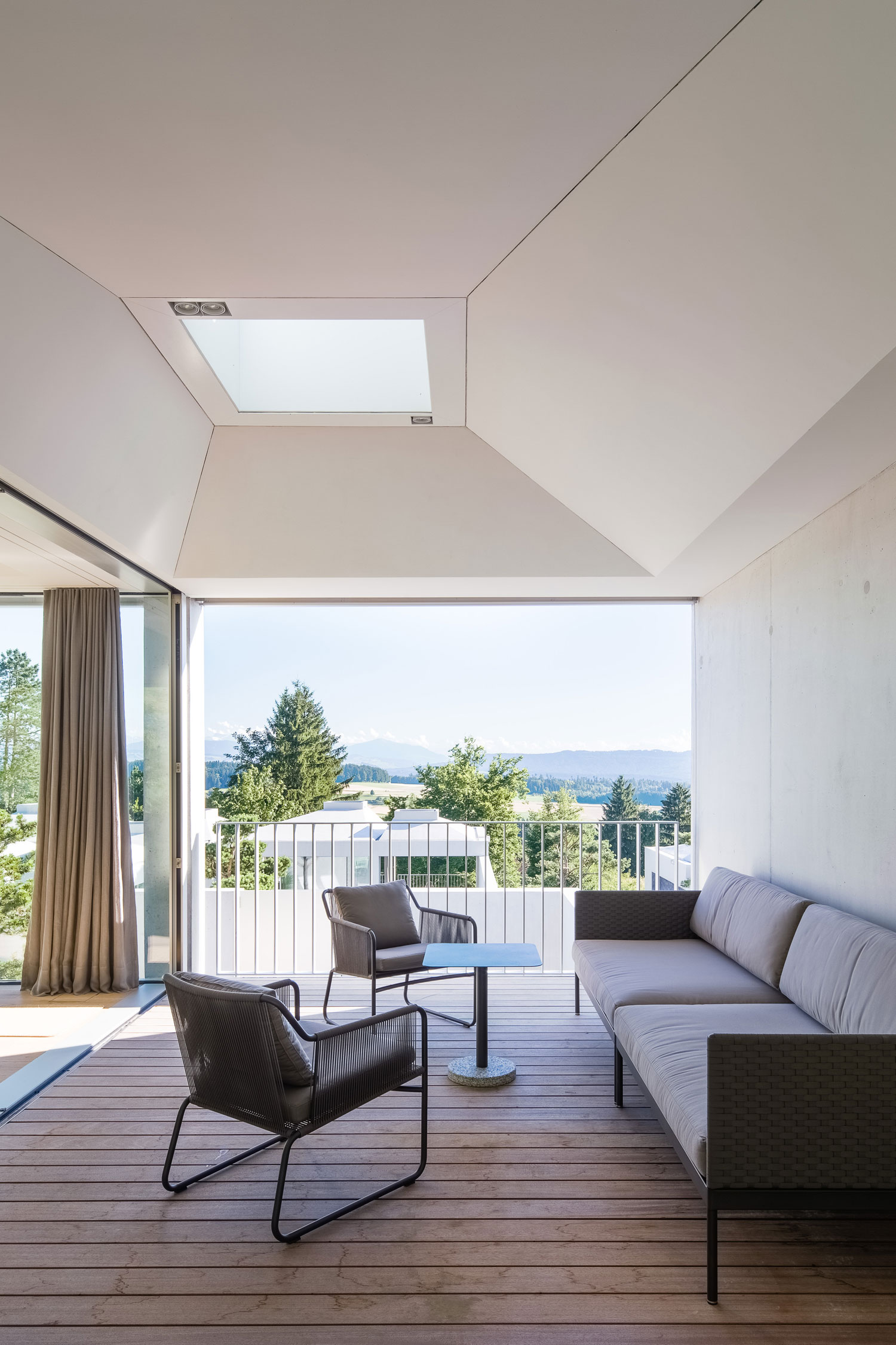 A Stunning Modern House with Four Courtyards in Zumikon, Switzerland by Think Architecture (11)