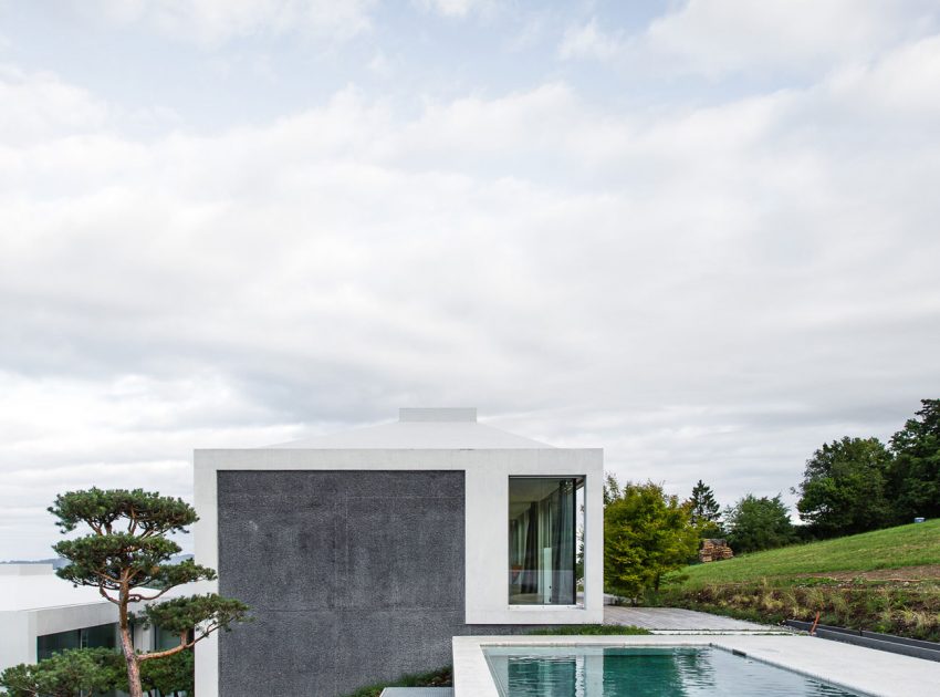 A Stunning Modern House with Four Courtyards in Zumikon, Switzerland by Think Architecture (2)